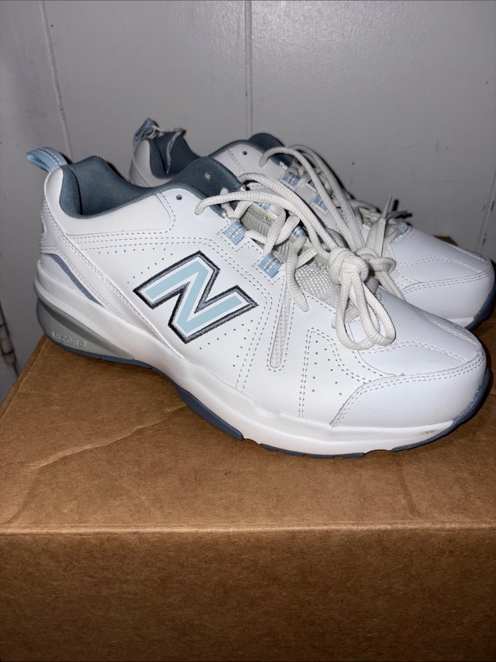 New Balance White Sneakers size 10.5 Women 9 Men